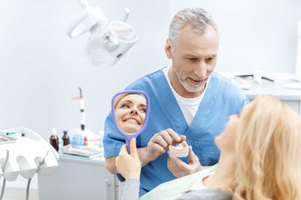 Dentist discussing treatment with patient